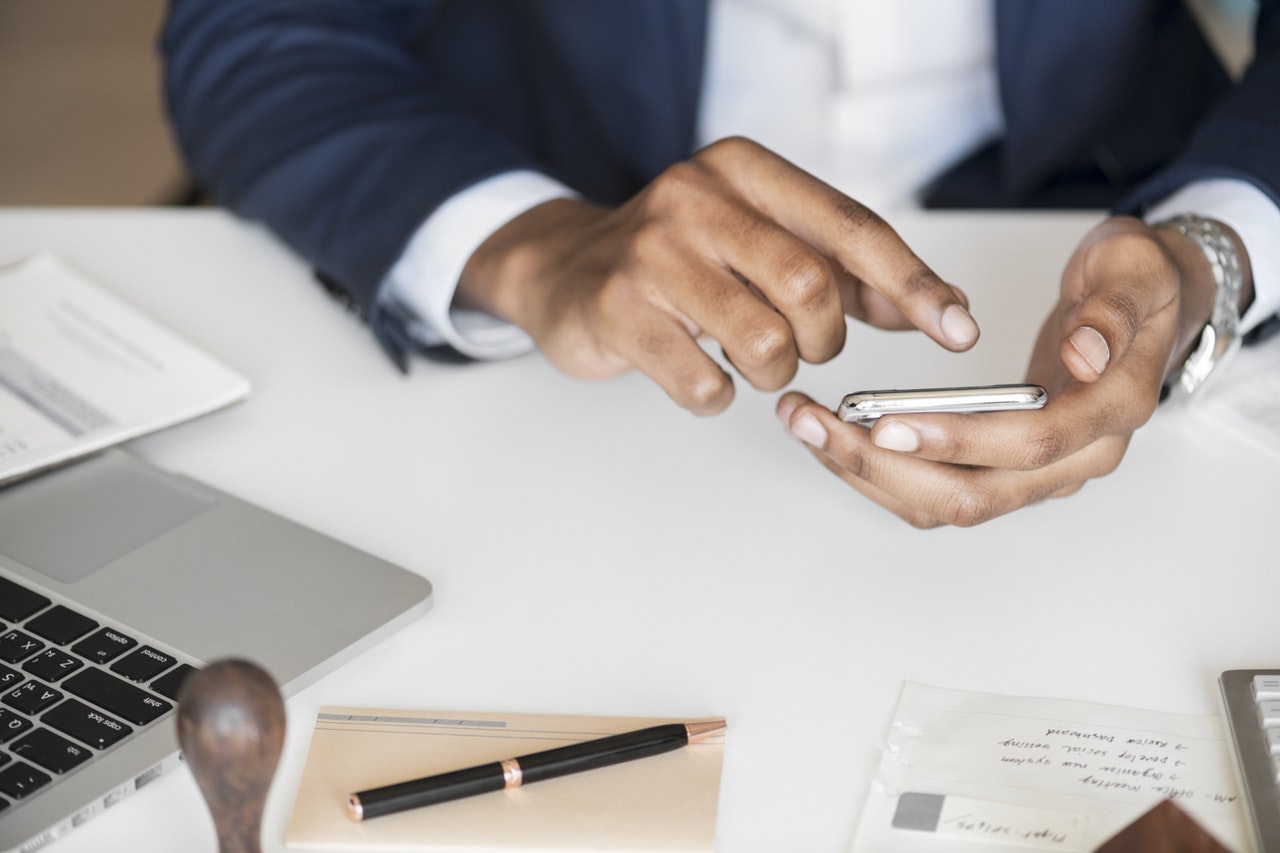 photo of a business person texting their personal assistant