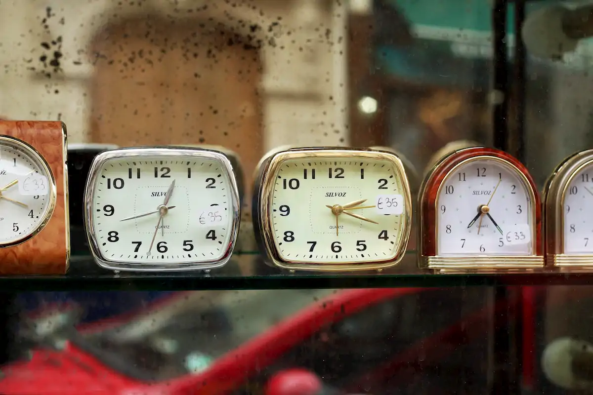 Photo of multiple different clocks sitting side-by-side to represent how different biological clocks affect productiiv 
